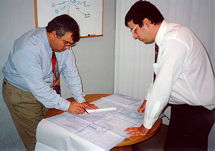 Reviewing technical blueprints for an infrastructure project